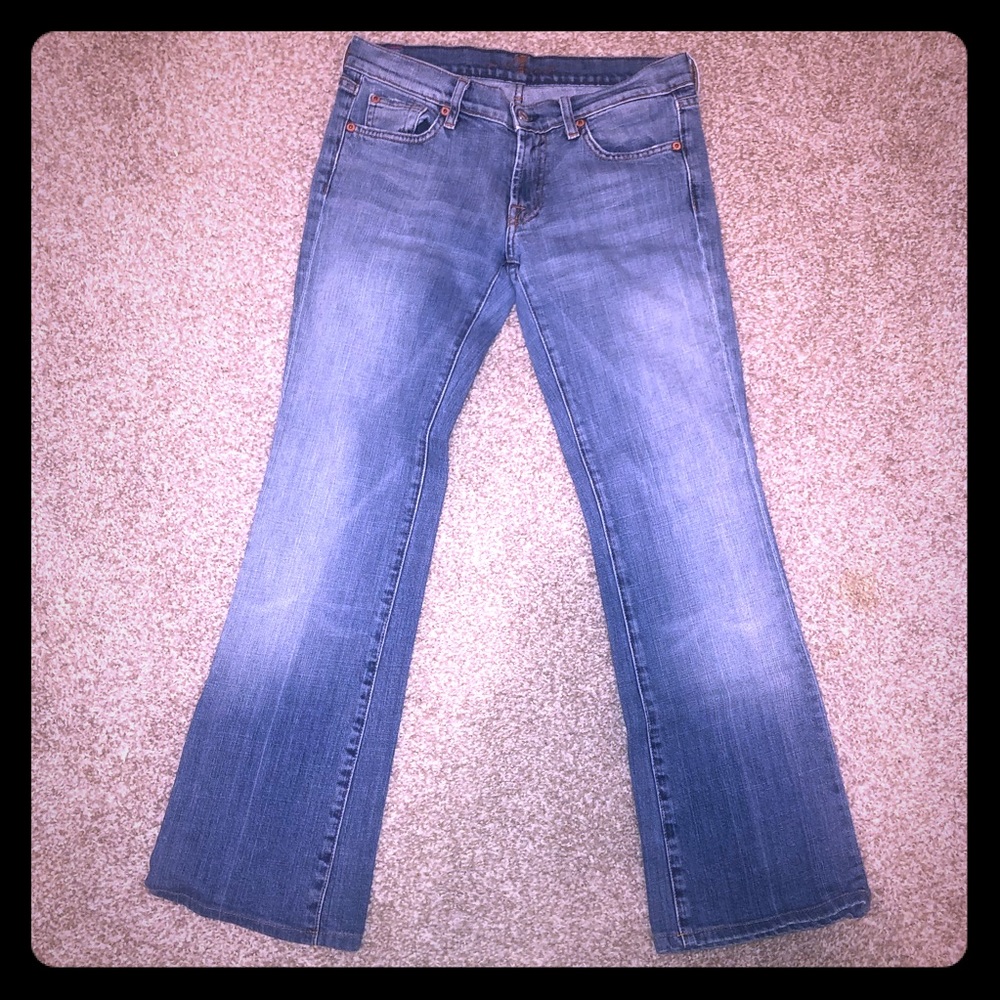 Distressed 7 For all Mankind jeans.
